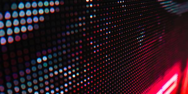 Pink and Blue Neon Pixel Texture Close up