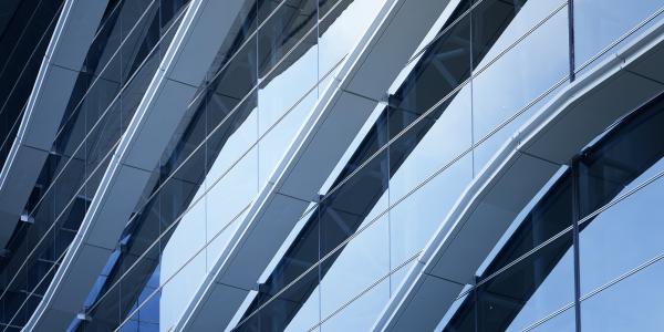 Angled railings on building with windows