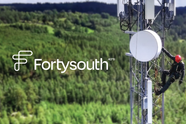 Fortysouth logo over photo of tower