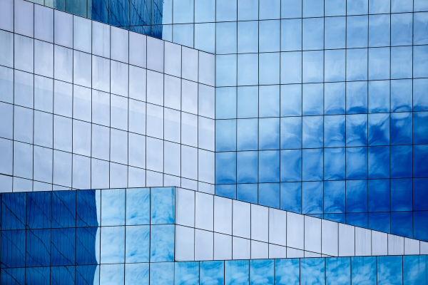 Geometric windowed building with blue tints
