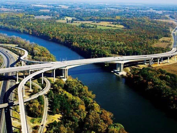 Ariel view of the Pocahontas Parkway with a large bridge going over a river