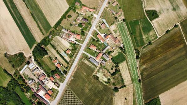 Aerial view of fields and houses