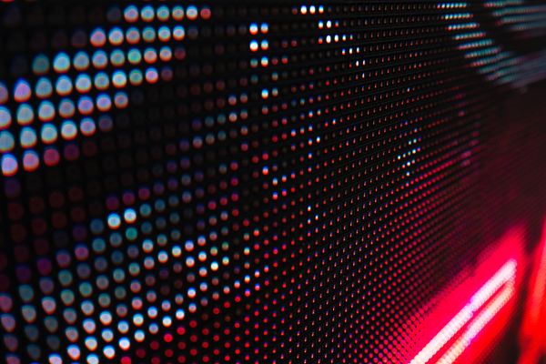 Pink and Blue Neon Pixel Texture Close up 
