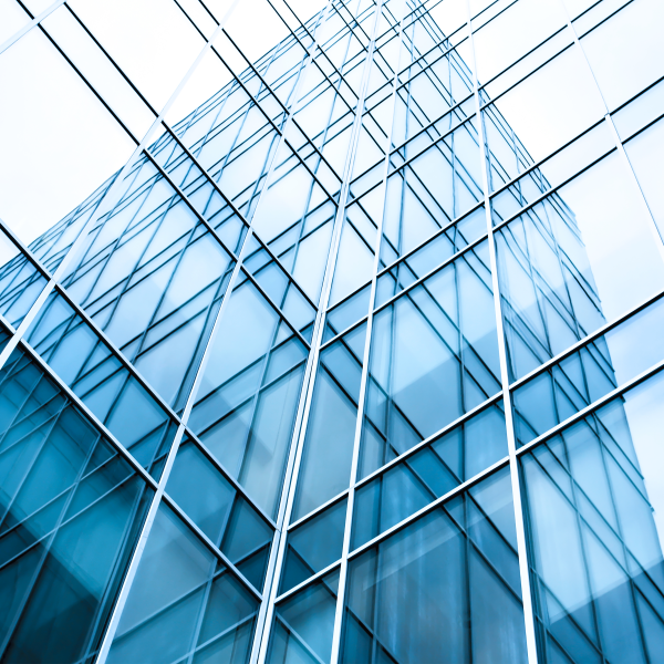 Blue glass grid office windows closeup
