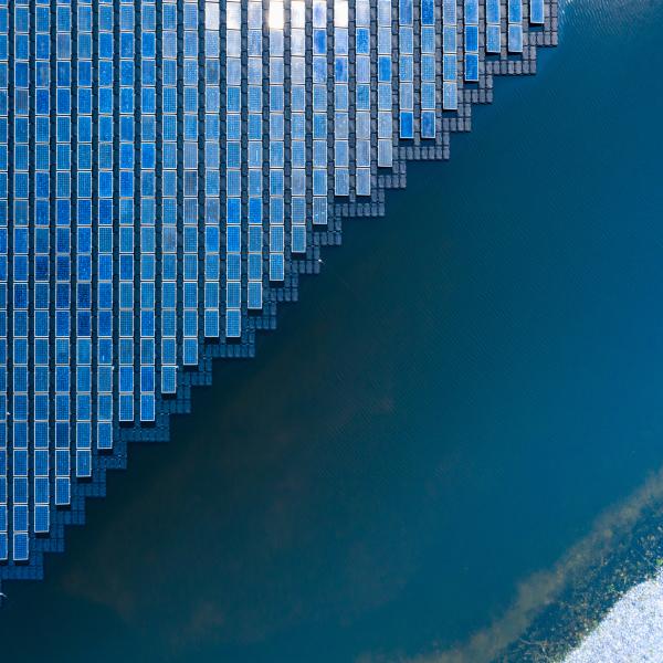 Blue solar panels near ocean