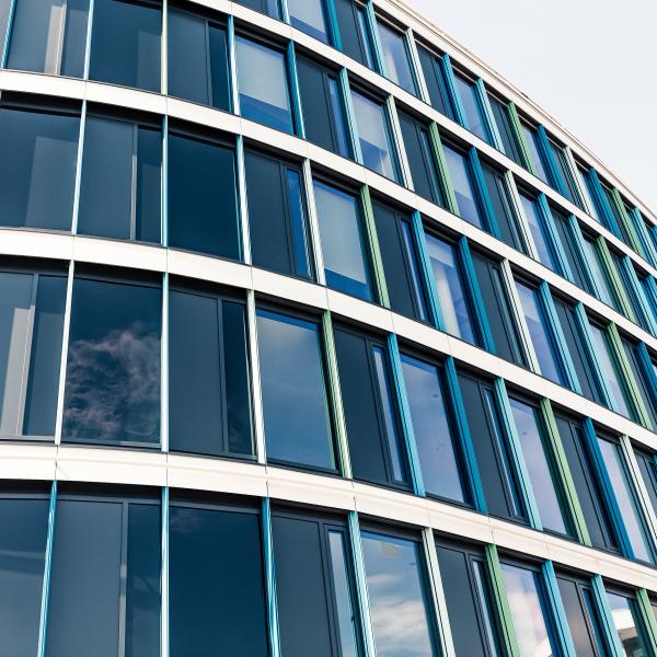 Curved exterior building windows