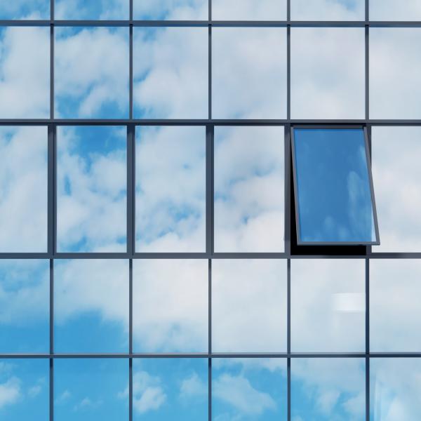 Windows reflecting the sky