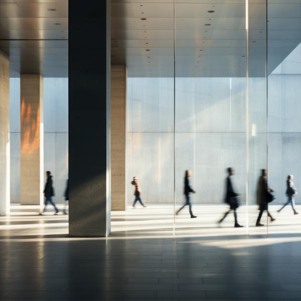 Business workers walking through building